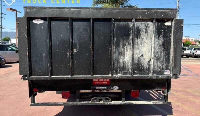 
								2012 Ford F-550 XL 12′ cama de estacas con puerta trasera (1600 LB) full									