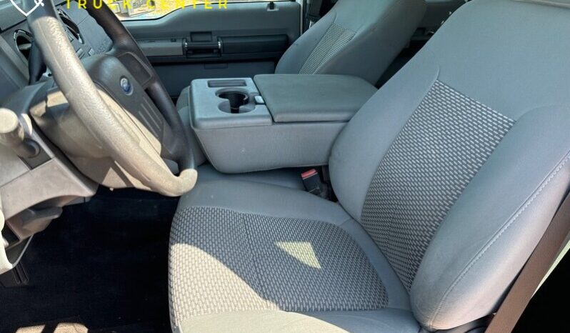 
								2012 Ford F-550 XL 12′ cama de estacas con puerta trasera (1600 LB) full									