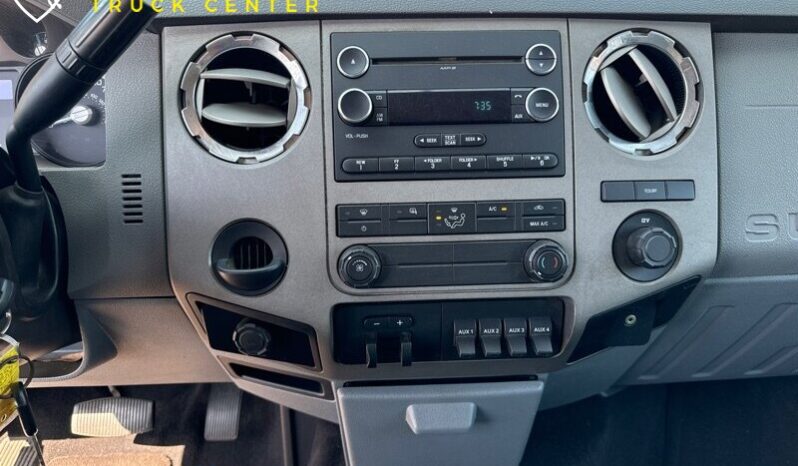 
								2012 Ford F-550 XL 12′ cama de estacas con puerta trasera (1600 LB) full									